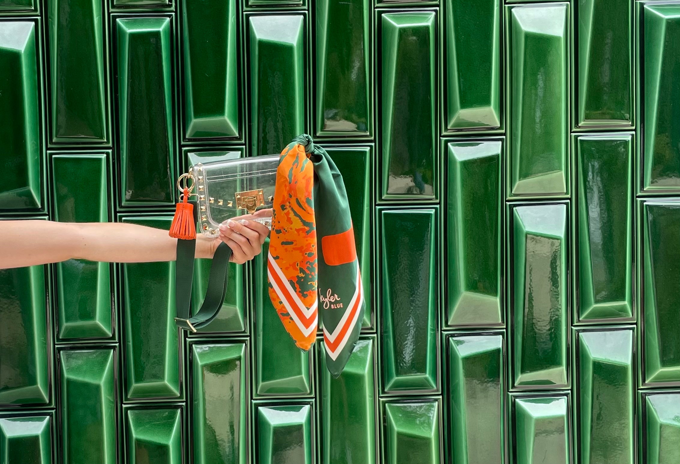 Skyler Blue's The Coral Gables collection of designer clear plastic bags for concerts and sporting events. Elegant, luxurious and game day ready.