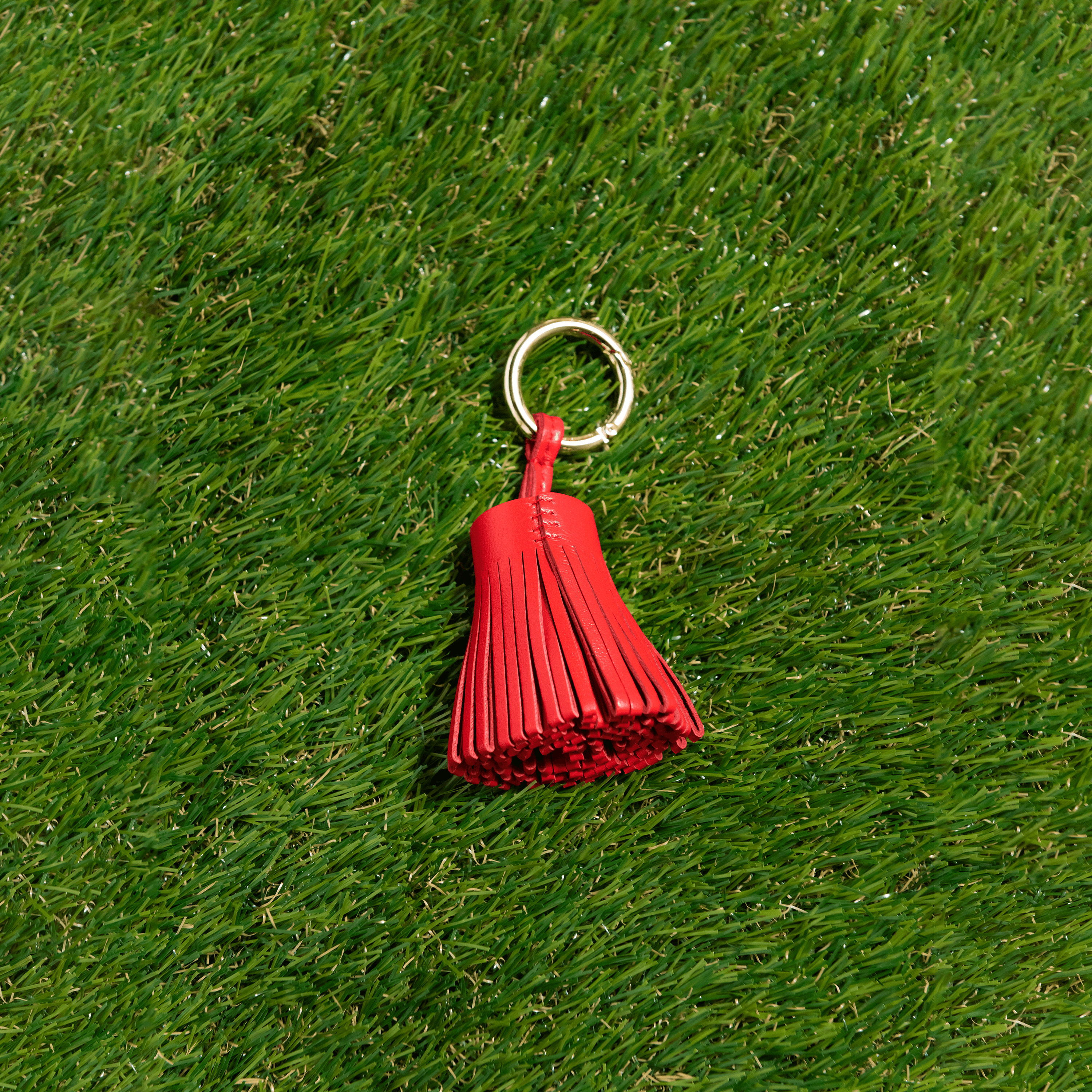 Skyler Blue’s red 100% genuine leather tassel.