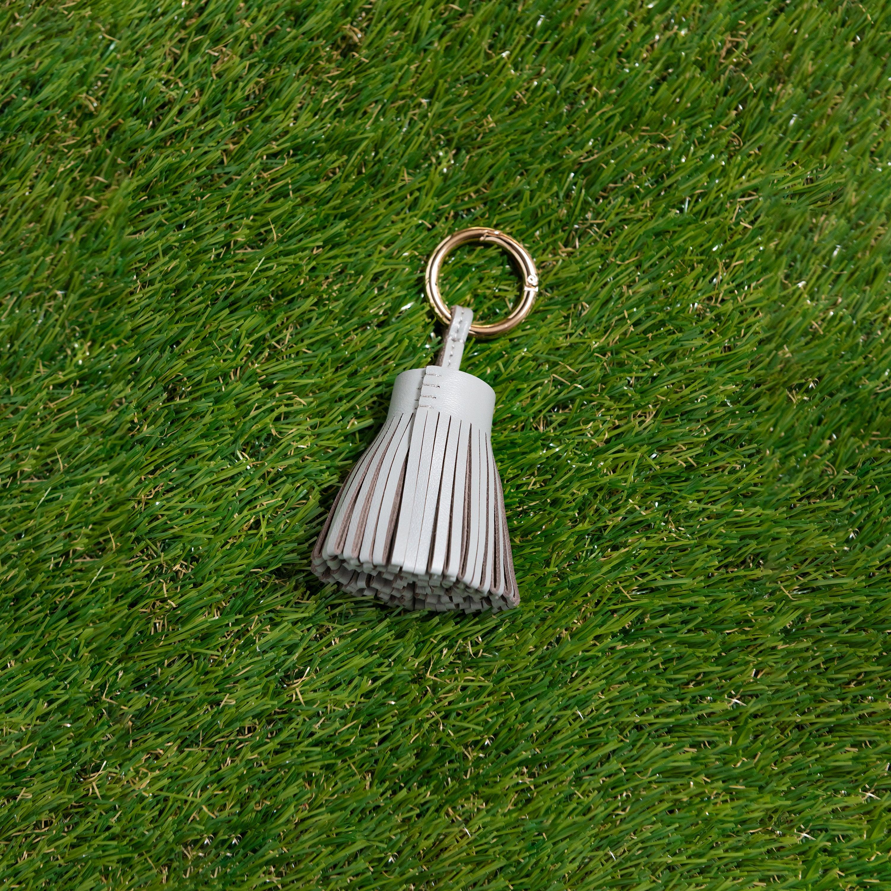 Skyler Blue’s grey 100% genuine leather tassel.