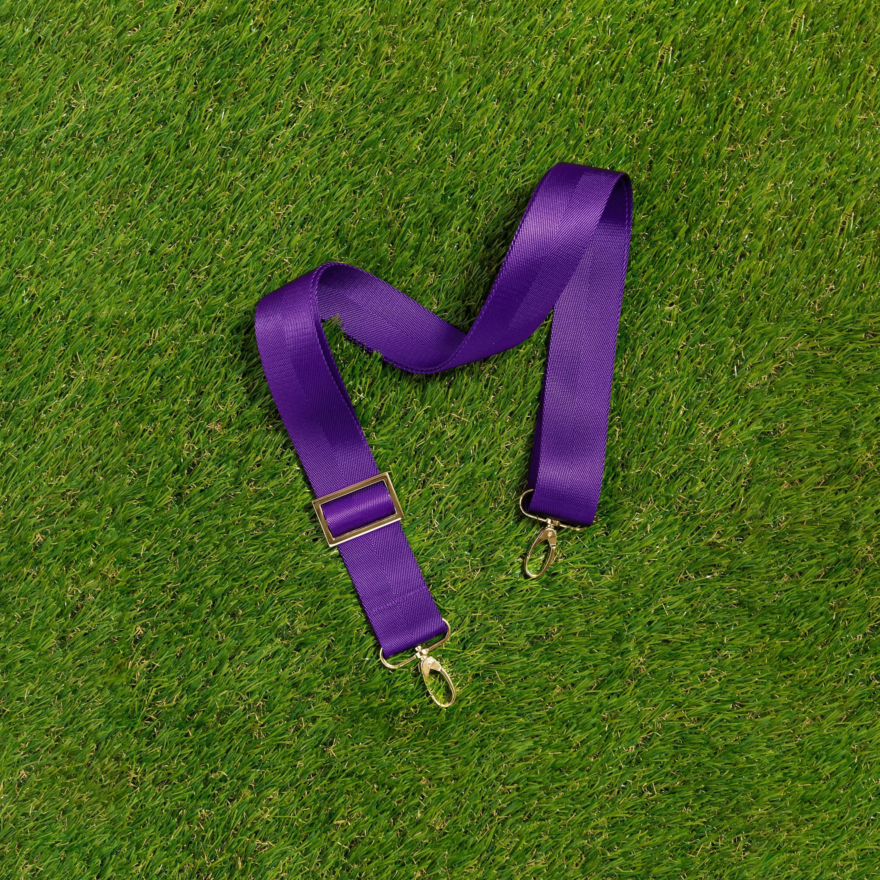 Skyler Blue’s adjustable, nylon webbing purple fanny pack strap with herringbone weave and gold hardware.