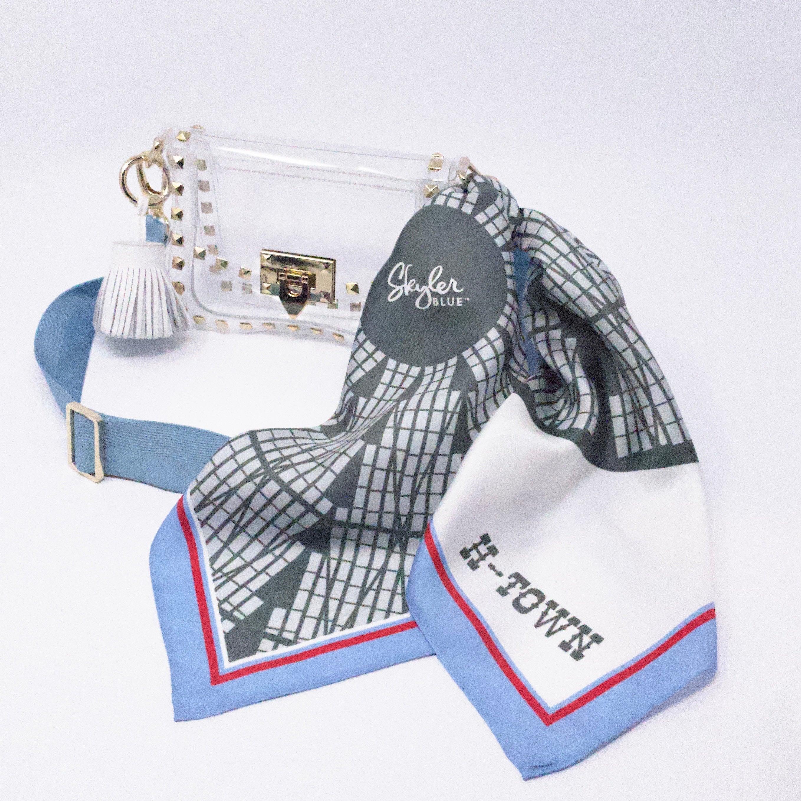Skyler Blue’s The Dome - H-Town Small Studded Clear Bag stadium approved clear bag / clear purse including adjustable, nylon webbing shoulder or crossbody strap with herringbone weave and gold hardware, 60-centimeter 100% silk twill scarf, and 100% genuine leather tassel.