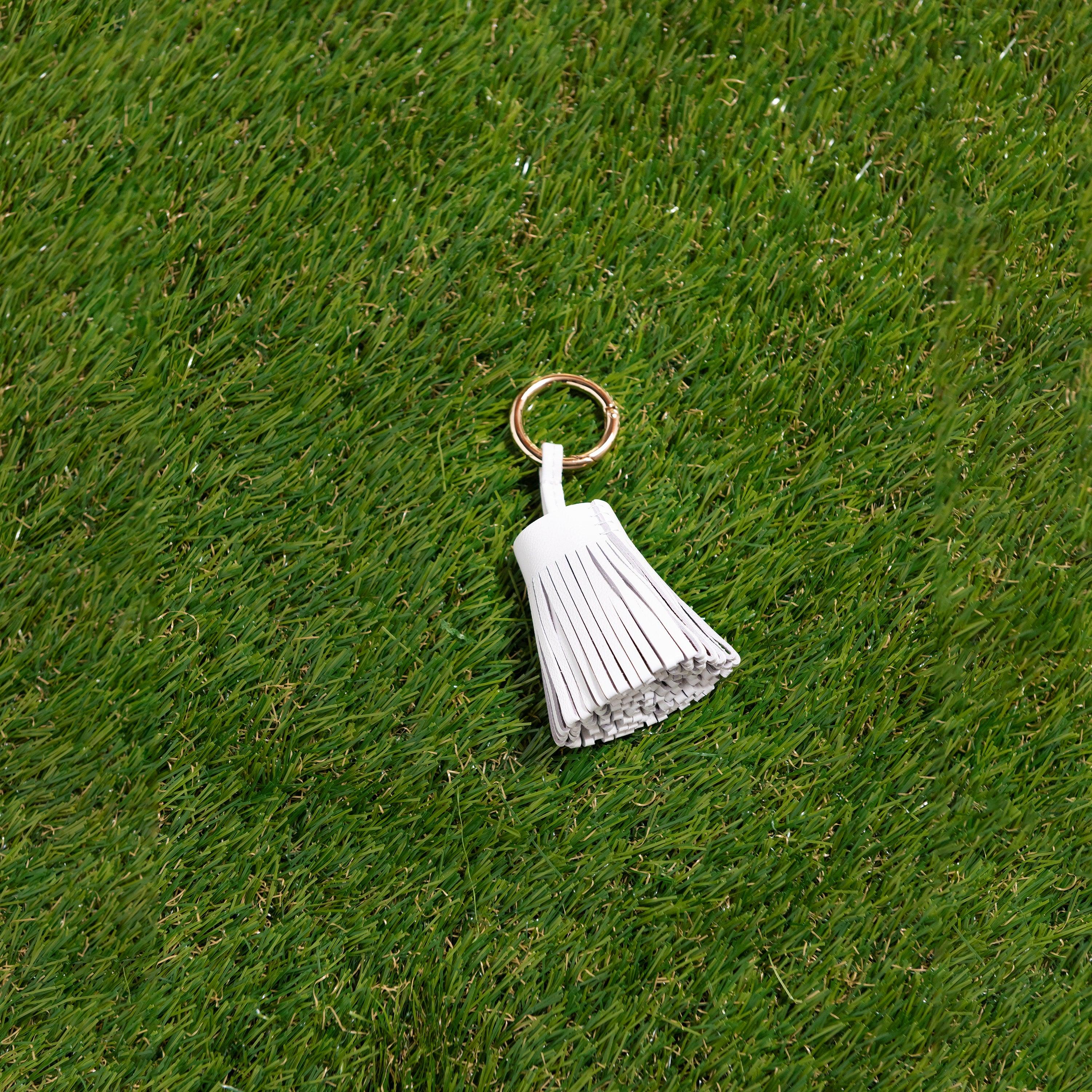 Skyler Blue’s white 100% genuine leather tassel.