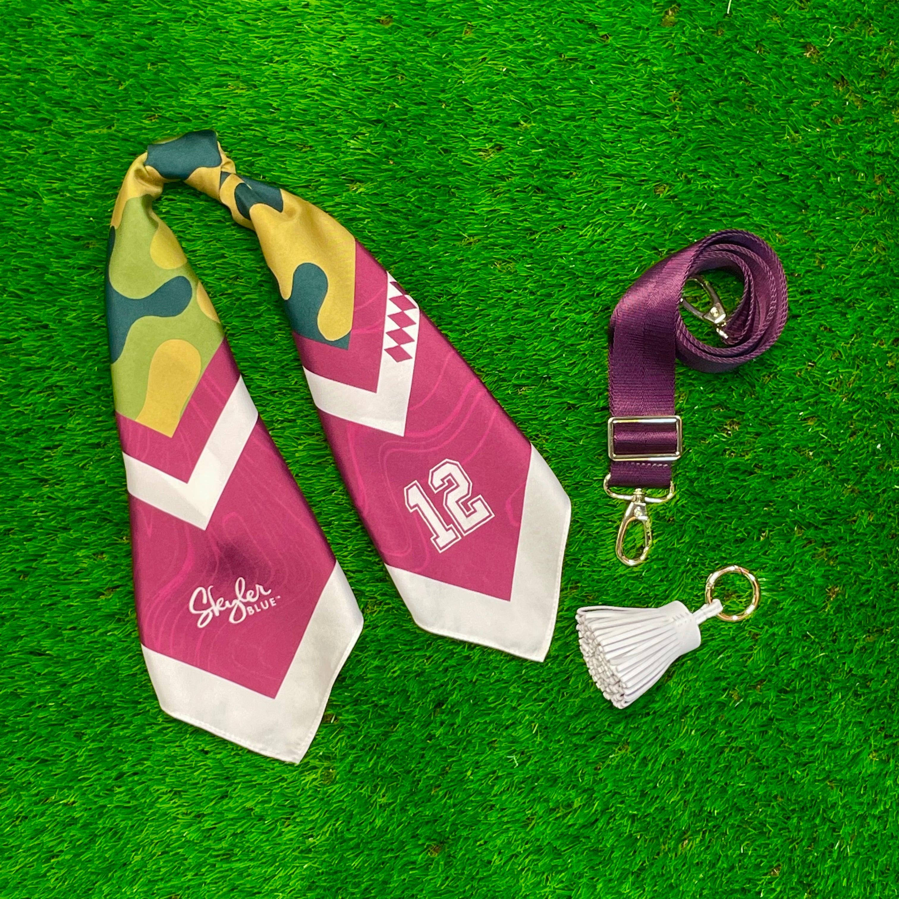 Skyler Blue’s The College Station Accessory Package including adjustable, nylon webbing shoulder or crossbody strap with herringbone weave and gold hardware, 60-centimeter 100% silk twill scarf, and 100% genuine leather tassel.