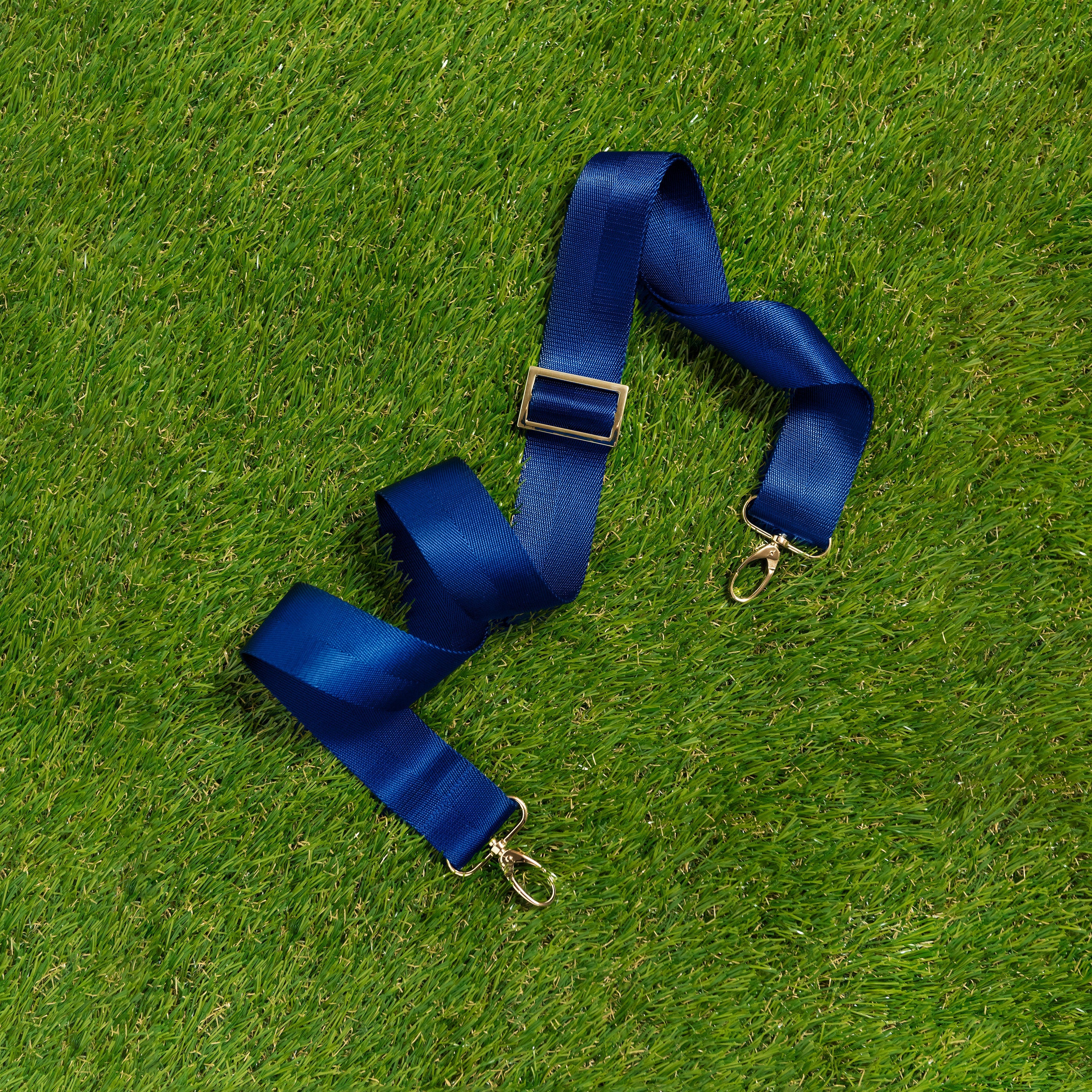 Skyler Blue’s adjustable, nylon webbing navy blue fanny pack strap with herringbone weave and gold hardware.  