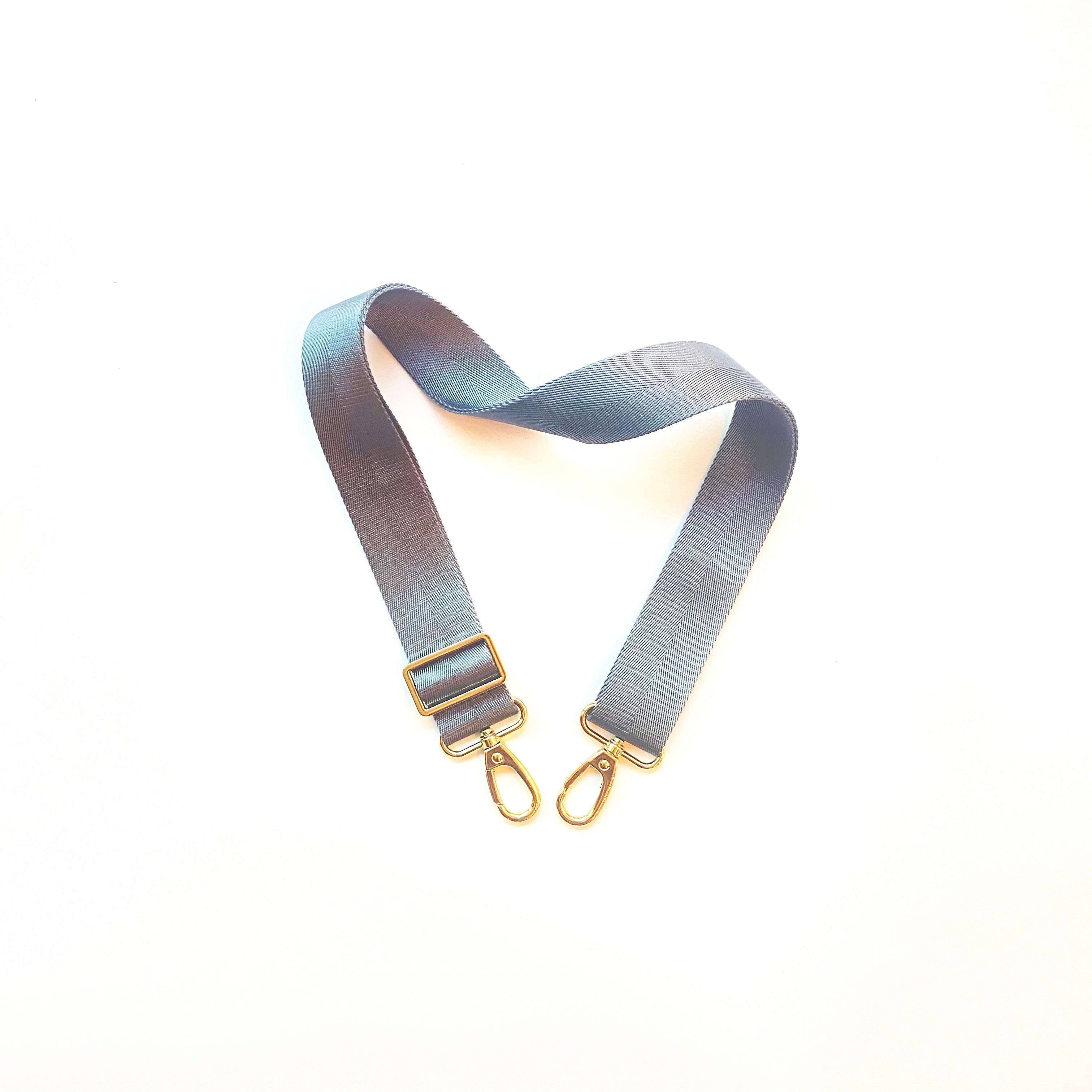 Skyler Blue’s adjustable, nylon webbing grey shoulder or crossbody strap with herringbone weave and gold hardware.  