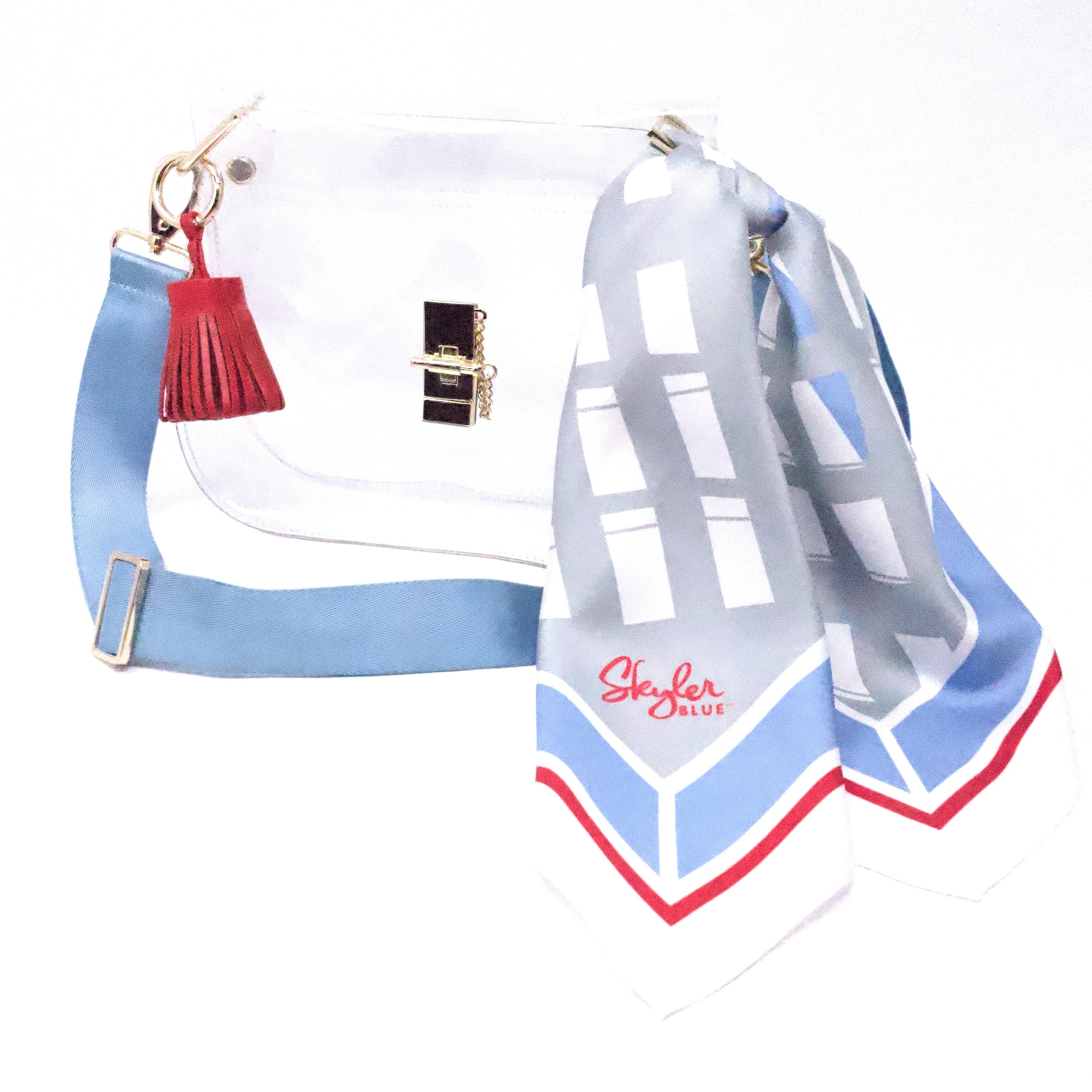 Skyler Blue’s The Dome - Luv Ya Medium Saddle Clear Bag stadium approved clear bag / clear purse including adjustable, nylon webbing shoulder or crossbody strap with herringbone weave and gold hardware, 60-centimeter 100% silk twill scarf, and 100% genuine leather tassel. 
