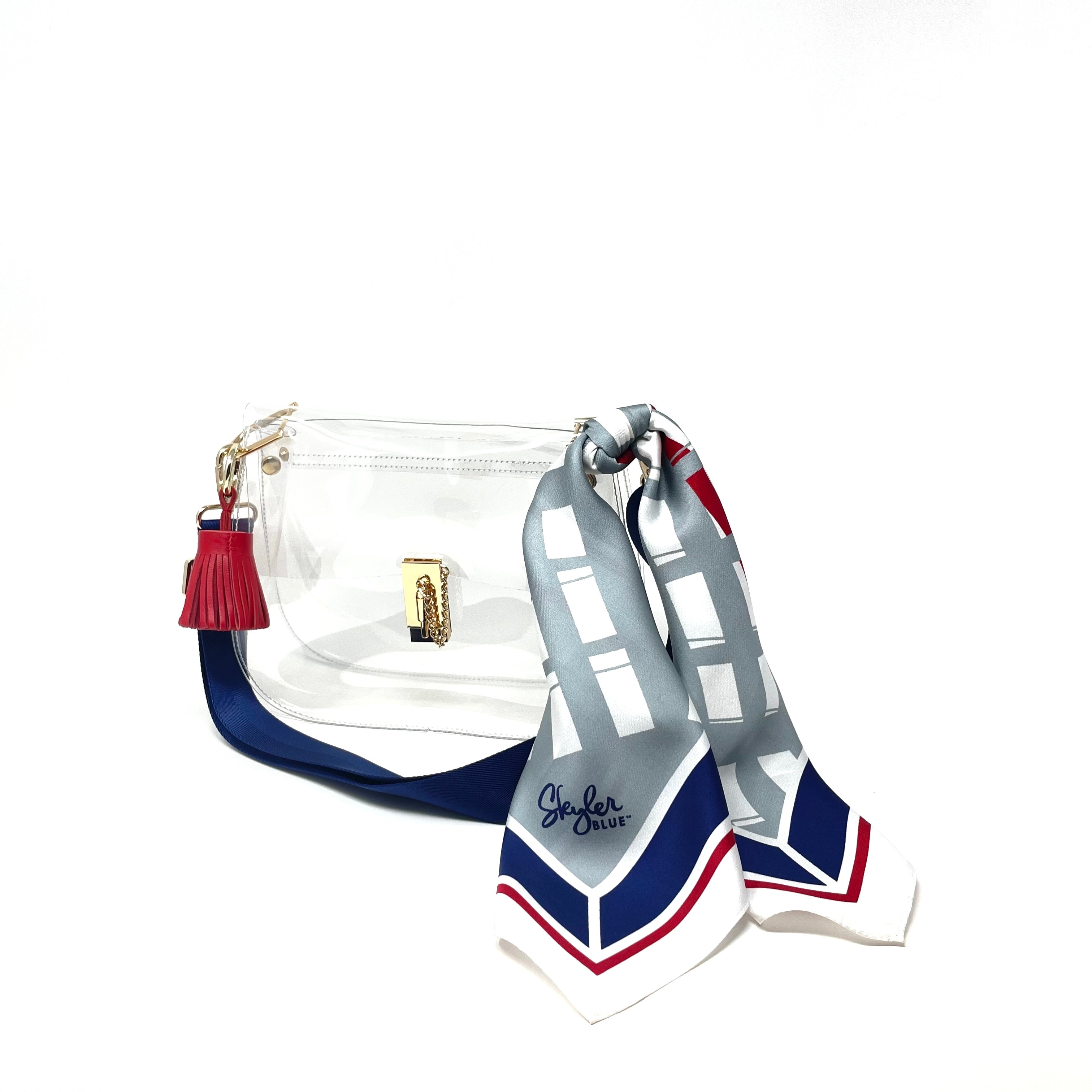 Skyler Blue’s The Dome - Go Texan Day Medium Saddle Clear Bag stadium approved clear bag / clear purse including adjustable, nylon webbing shoulder or crossbody strap with herringbone weave and gold hardware, 60-centimeter 100% silk twill scarf, and 100% genuine leather tassel. 