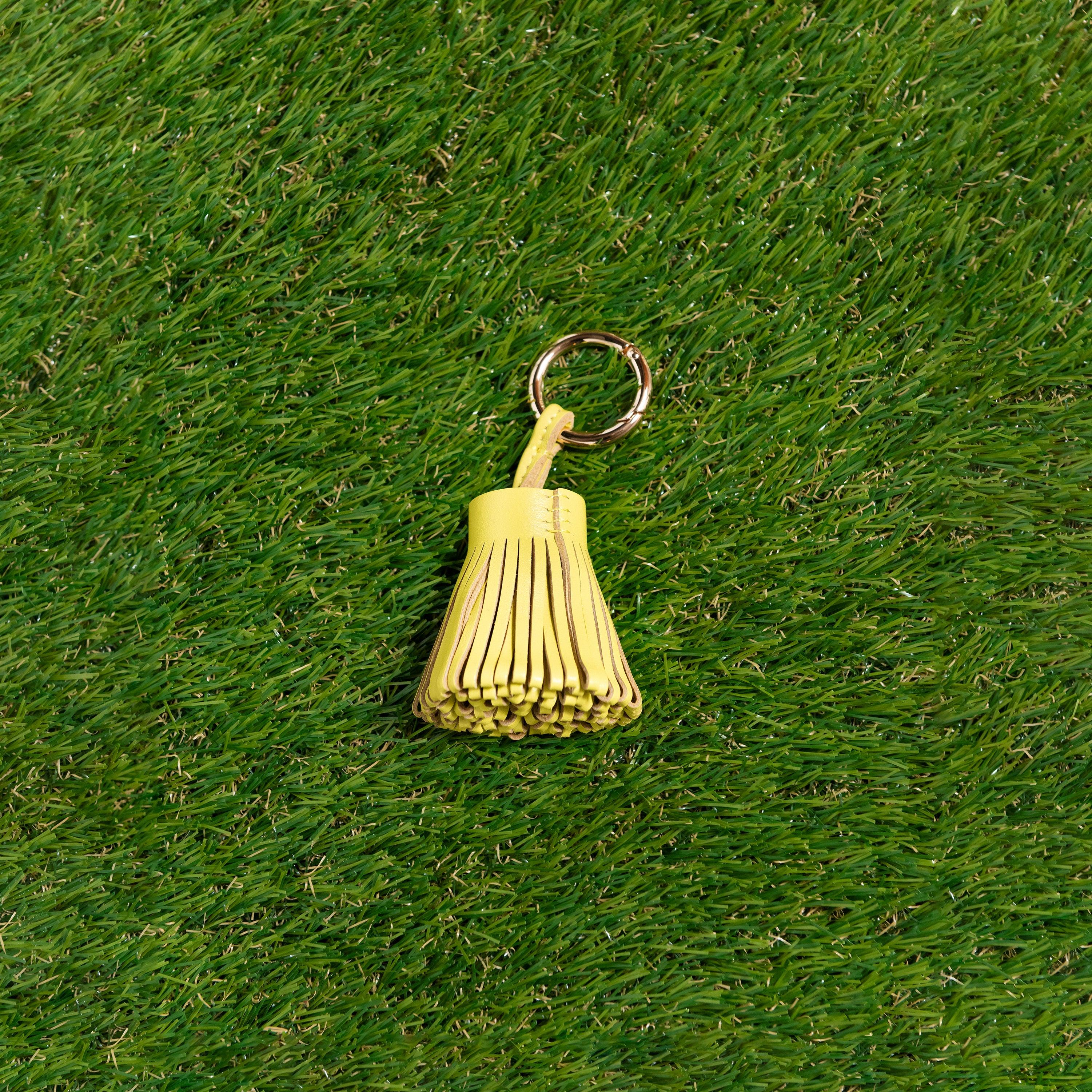 Skyler Blue’s yellow 100% genuine leather tassel. 